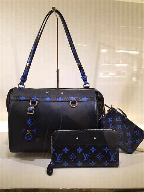 blue louis vuitton bag|Altro.